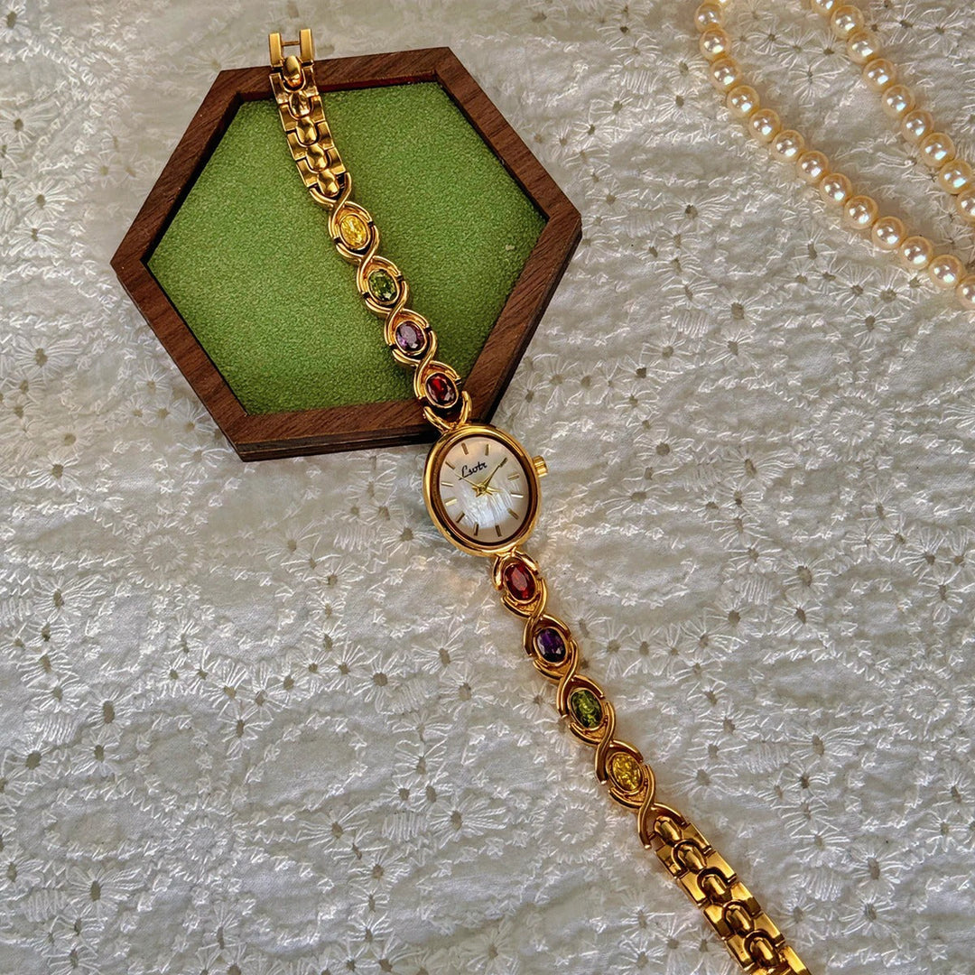 Damen Armbanduhr Oval mit Edelsteinakzenten 4
