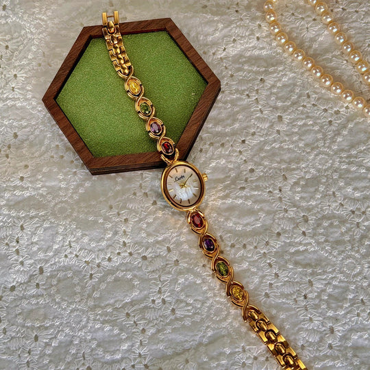 Damen Armbanduhr Oval mit Edelsteinakzenten 4