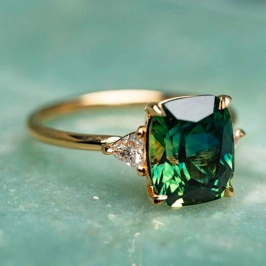 Damen Ring mit quadratischem Smaragdstein 0