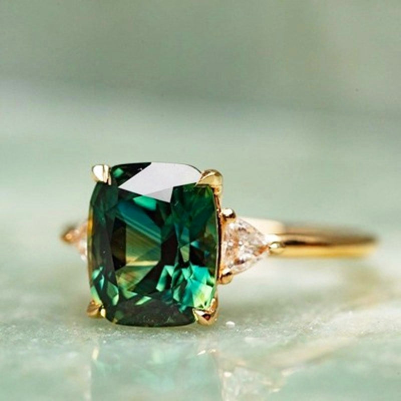 Damen Ring mit quadratischem Smaragdstein 1