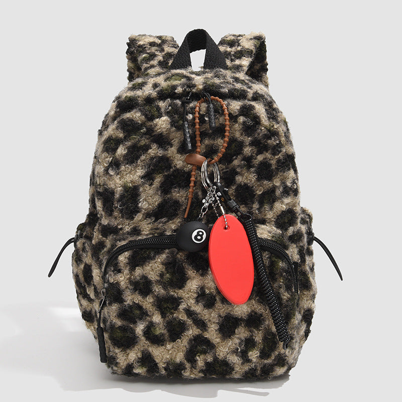 Damen Rucksack mit Kunstfell und Animal-Print Design 2
