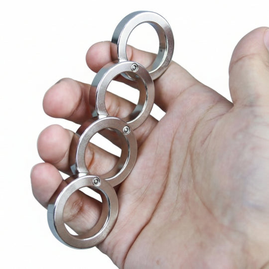 Faltbarer Vier-Finger-Ring für Stressabbau 0