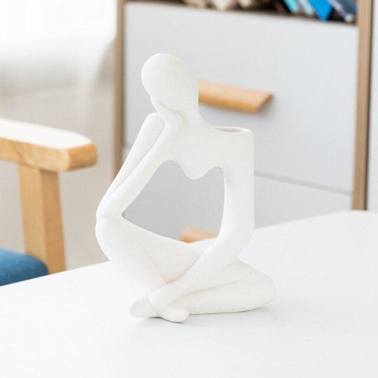 Kunstvolle Blumenvase Denkender Mann mit Einzigartigem Lochdesign 7