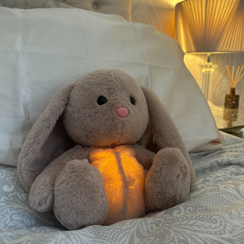 Kuscheltier Plüschfreund mit Atemsimulation und Nachtlicht für Entspannung 0