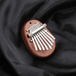 Mini Kalimba 8-Key Kompakt für Anfänger 5