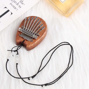 Mini Kalimba 8-Key Kompakt für Anfänger 6
