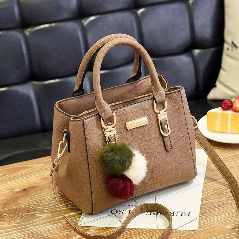 Damenhandtasche aus Leder mit Quaste