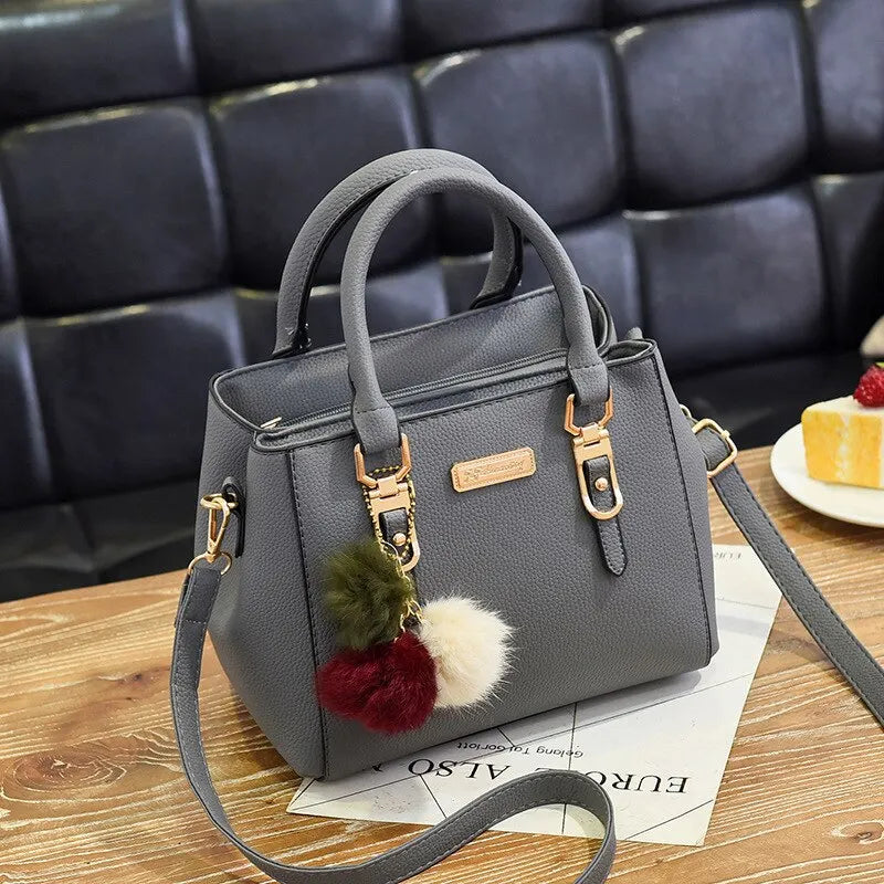 Damenhandtasche aus Leder mit Quaste