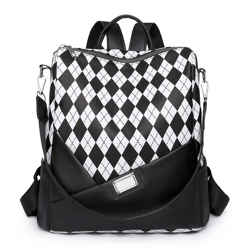 Unisex Rucksack mit auffälligem Harlekinmuster 0