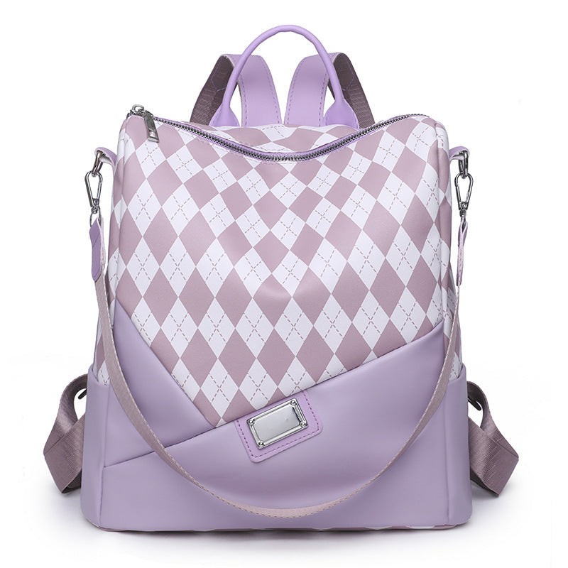 Unisex Rucksack mit auffälligem Harlekinmuster 1